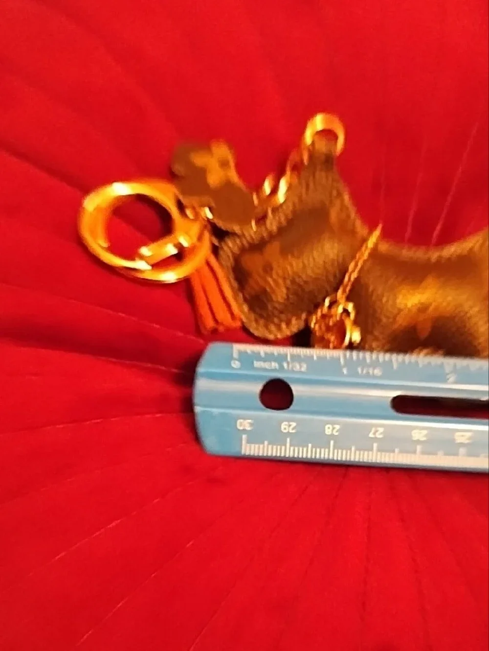 Stylish Brown Dog Keychain with Gold Accents